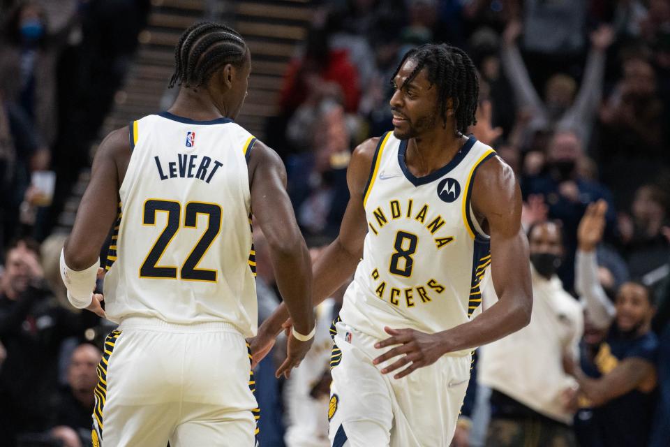 Jan 31, 2022; Indianapolis, Indiana, USA; Indiana Pacers forward Justin Holiday (8) reacts to a made basket in the second half against the LA Clippers at Gainbridge Fieldhouse.