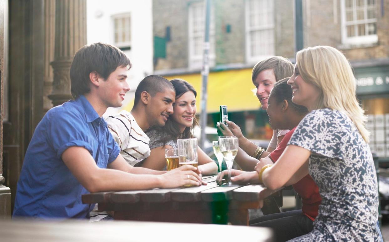 YOUNG PEOPLE AT PUB