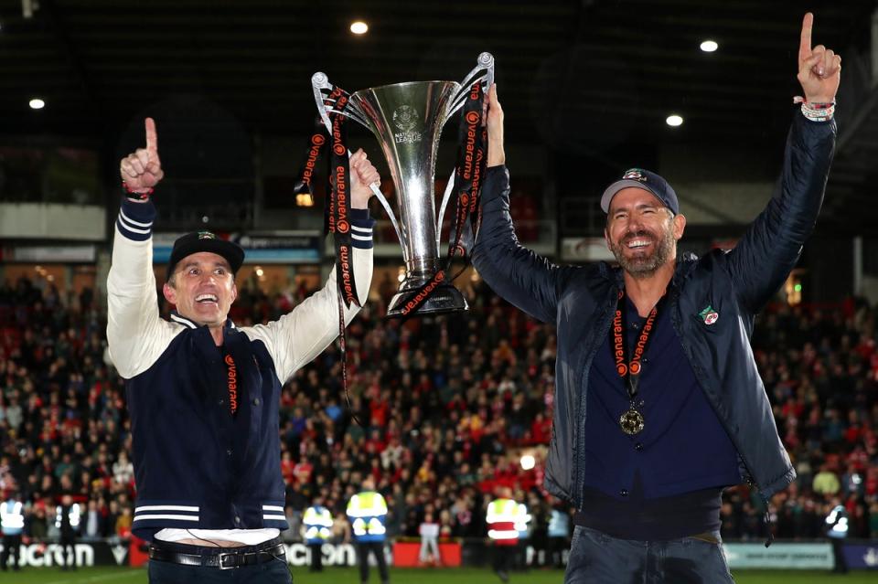 Rob McElhenney and Ryan Reynolds celebrated Wrexham’s promotion last April (Getty Images)