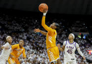 Tennessee guard Jordan Walker, second from right, shoots past LSU guard Alexis Morris (45) in the second half of an NCAA college basketball game in Baton Rouge, La., Monday, Jan. 30, 2023. (AP Photo/Derick Hingle)