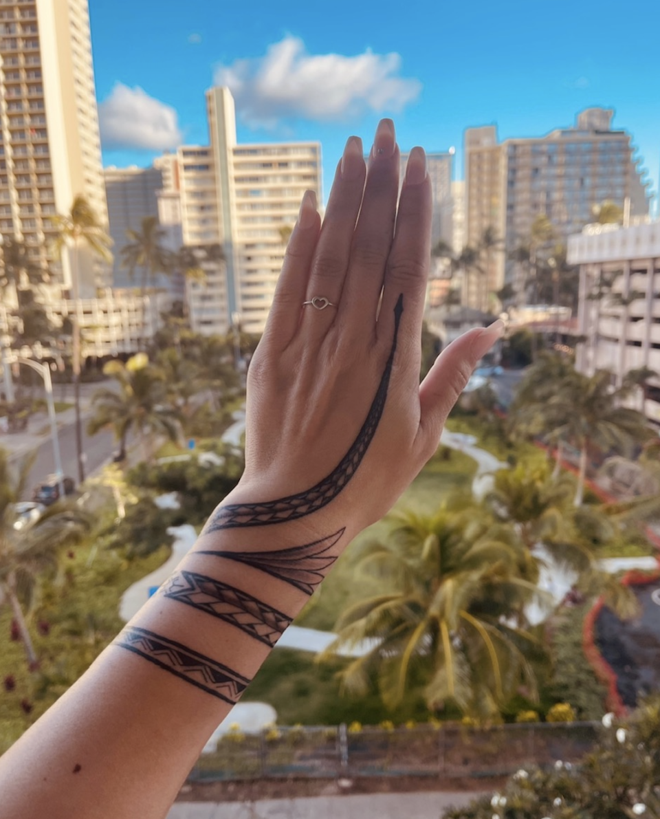 The writer's hand tattoo