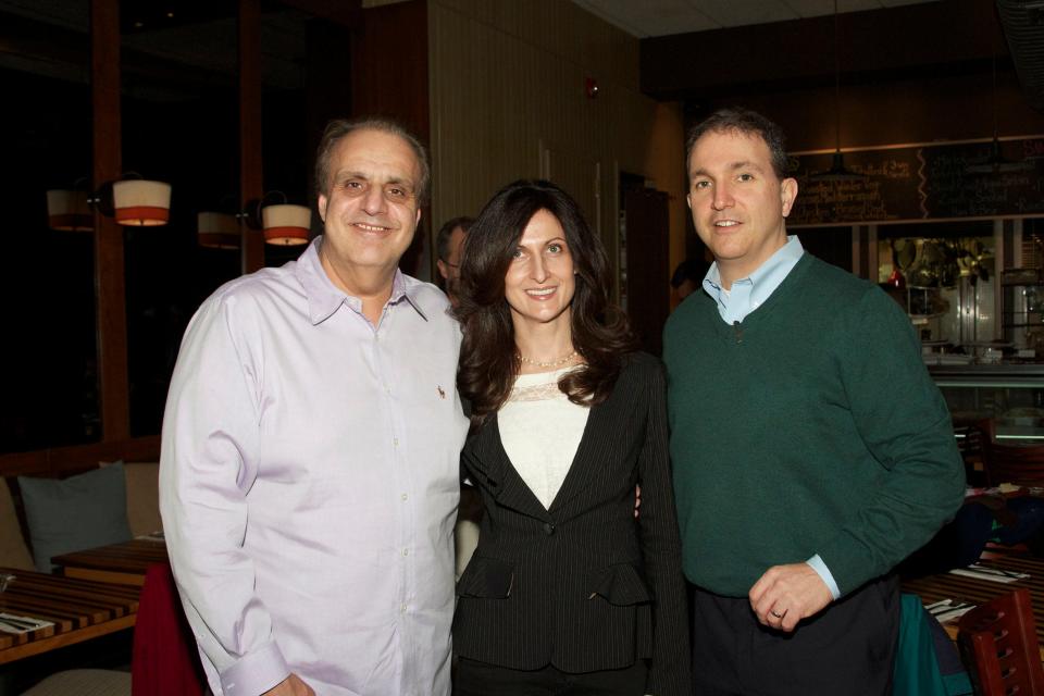 Divna Rosasco, center, at the grand opening of the restaurant Ridgewood Fare in Ridgewood in Feb. 2013 with her husband Victor, left, and then-Ridgewood Mayor Paul Aronsohn.