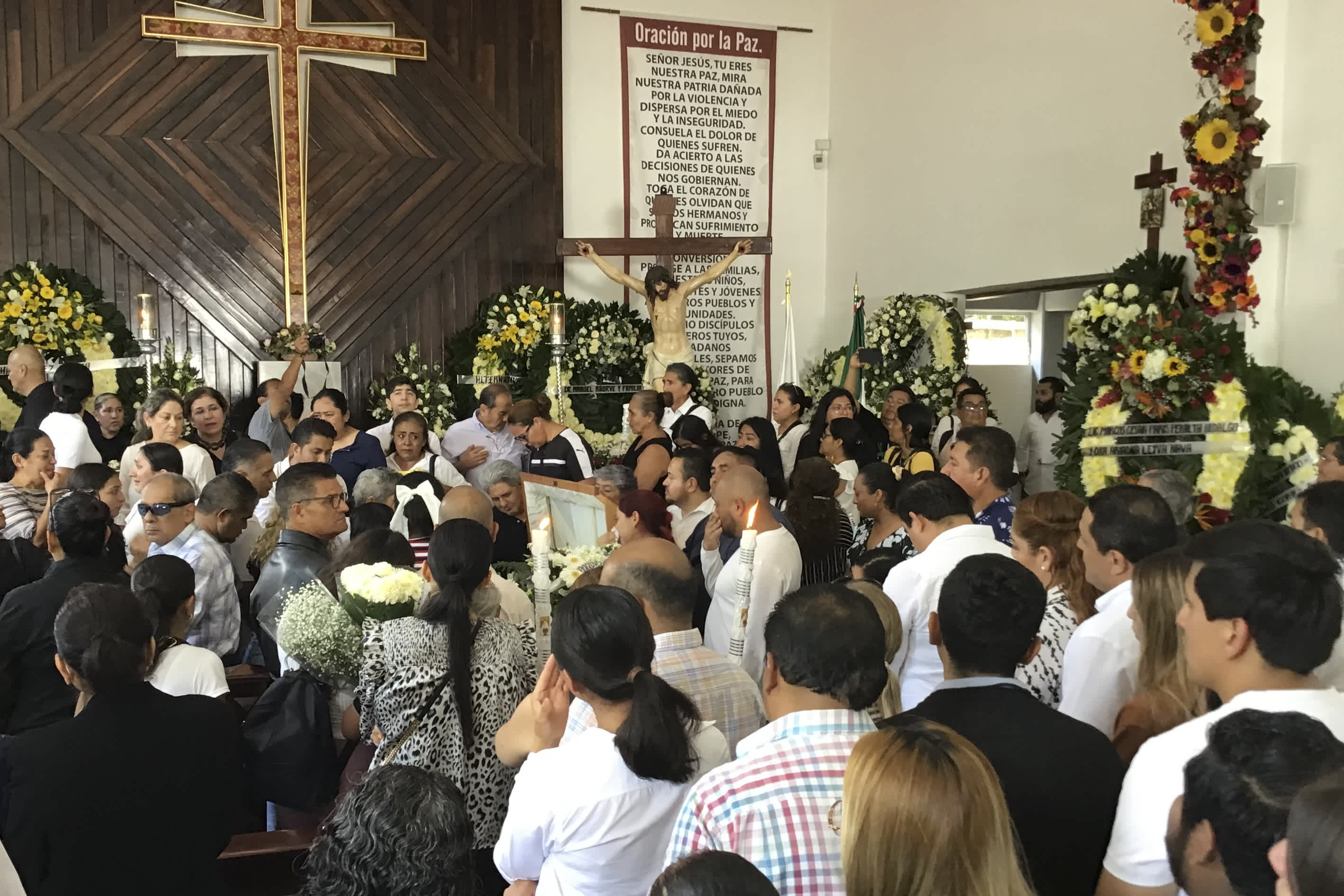 Supporters of slain Mayor Alejandro Arcos attend his funeral Mass one week after he took office, in Chilpancingo, Mexico, Monday, Oct. 7, 2024. (AP Photo/Alejandrino Gonzalez)