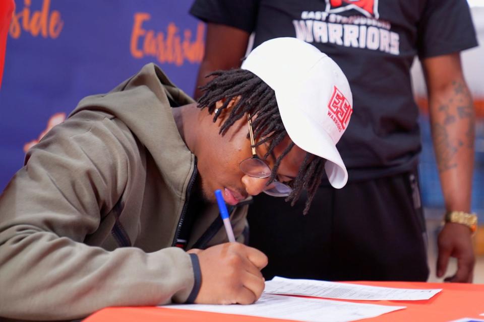 Eastside football player Elijah Carroll signs a letter of commitment for East Stroudsburg University at Eastside High School on Wednesday, February 1, 2023. 