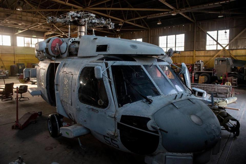 A SH-60B Seahawk helicopter inside Castle Air Museum’s restoration hanger in Atwater, Calif., on Wednesday, Jan. 12, 2022. According to Castle Air Museum Chief Executive Director Joe Pruzzo, the museum acquired a Bell AH-1W Cobra attack helicopter and the SH-60B Seahawk helicopter from Hawaii in 2021. When ready, the aircraft will be displayed on the Castle Air Museum grounds along with dozens of other vintage aircraft.