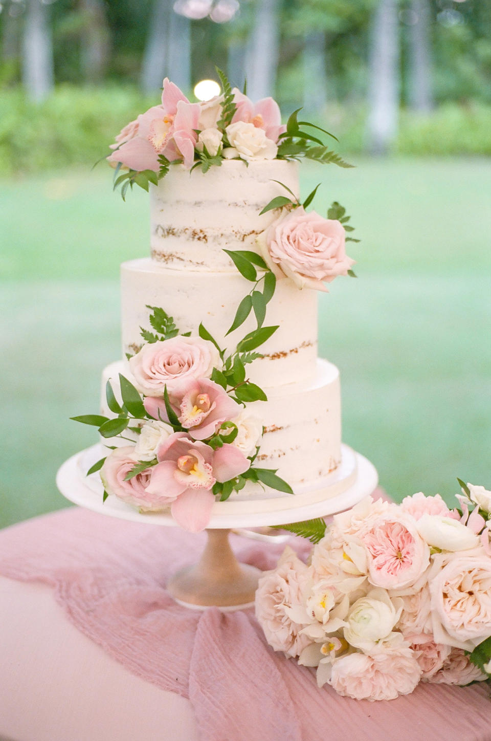 Naked Wedding Cake with Pastel Flowers