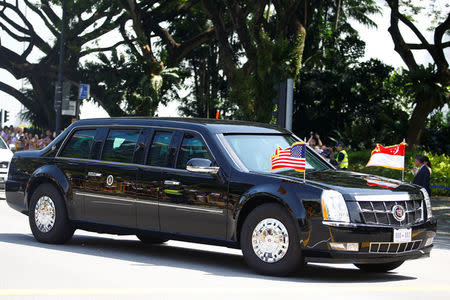 U.S. President Donald Trump's motorcade arrives at the Istana ahead of his meeting with Singapore's Prime Minister Lee Hsien Loong in Singapore, June 11, 2018. REUTERS/Feline Lim