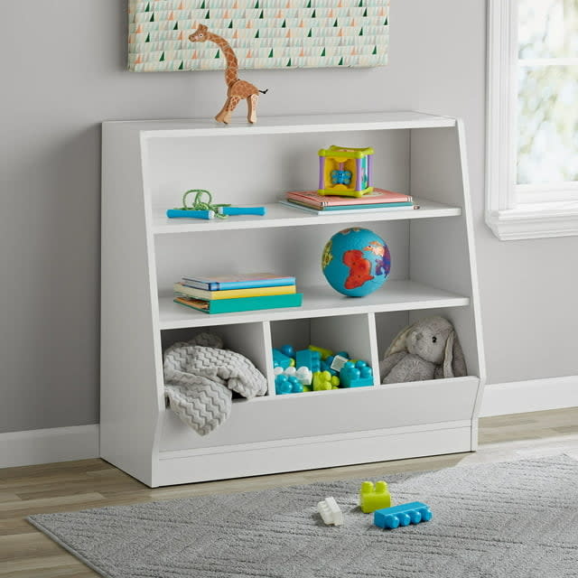 White bookshelf with bins