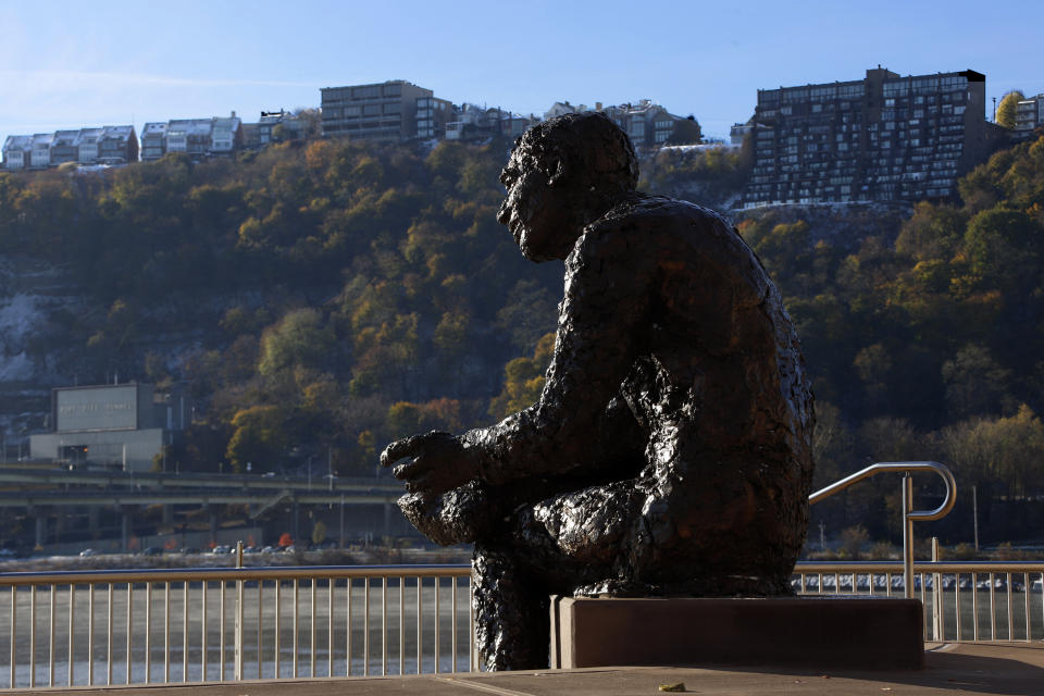 This Nov. 13, 2019, photo shows a statue of Fred Rogers perched at the confluence of the Allegheny, Monongahela, and Ohio Rivers in the Northside of Pittsburgh. Rogers' preschool television series "Mister Rogers' Neighborhood," filmed in Pittsburgh, aired from 1968 to 2001. (AP Photo/Gene J. Puskar)