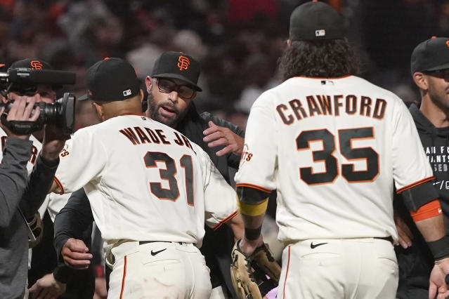 SF Giants pop champagne after NL playoffs clincher over Padres