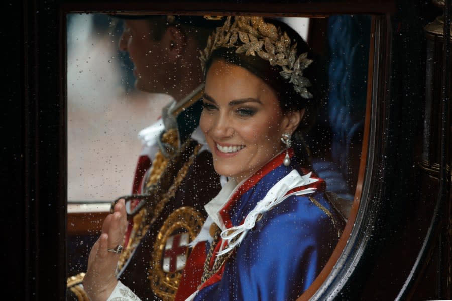 FILE – Kate, Princess of Wales, and Prince William travel in a coach following the coronation ceremony of Britain’s King Charles III in London, Saturday, May 6, 2023. The Princess of Wales has been hospitalized for planned abdominal surgery and will remain at The London Clinic for up to two weeks, Kensington Palace said Wednesday, Jan. 17, 2024. (AP Photo/David Cliff, File)