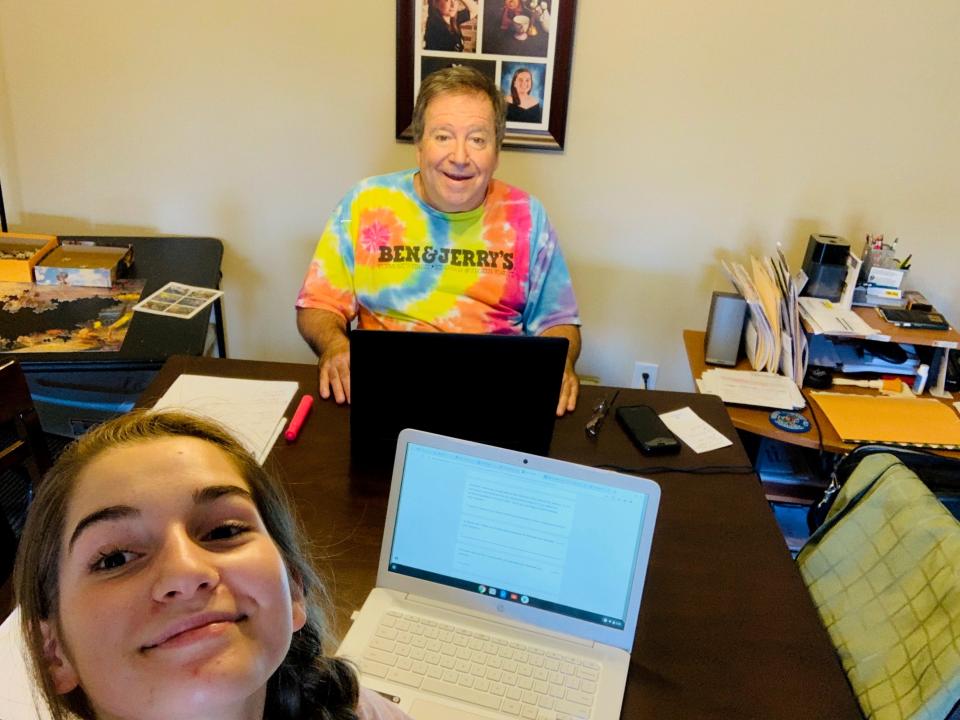 Then-high school freshman Alexandra Pugliese and her father school/work from home in the spring of 2020 during the COVID pandemic.