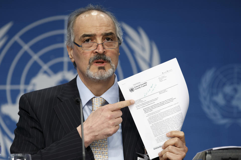 Syrian Ambassador to the United Nations, Bashar Ja'afari, points to a document during a press conference during the Syrian peace talks in Montreux, Switzerland, Wednesday, Jan. 22, 2014. U.N. Secretary-General Ban Ki-moon opened the meeting saying that the peace talks will face "formidable" challenges for Syria. Ban called on the Syrian government and the opposition trying to overthrow it to negotiate in good faith.(AP Photo/KEYSTONE/Salvatore Di Nolfi)