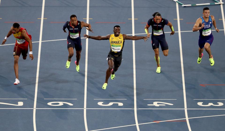 <p>Omar Mcleod of Jamaica wins the gold medal in the Men’s 110m Hurdles Final ahead of silver medalist Orlando Ortega of Spain and bronze medalist Dimitri Bascou of France on Day 11 of the Rio 2016 Olympic Games at the Olympic Stadium on August 16, 2016 in Rio de Janeiro, Brazil. (Photo by Alexander Hassenstein/Getty Images) </p>