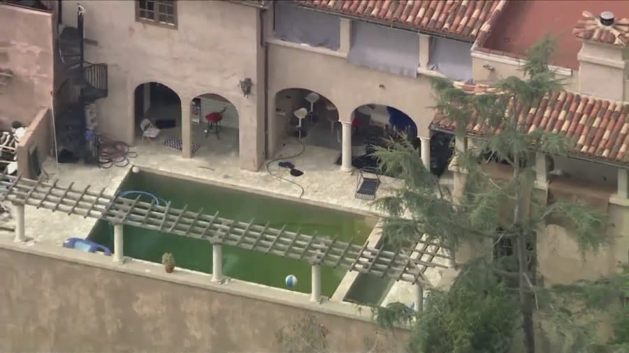 Squatters have turned an unoccupied Beverly Crest mansion into a wild party house, disrupting neighbors while telling police they have a legitimate lease on the property. (KTLA)