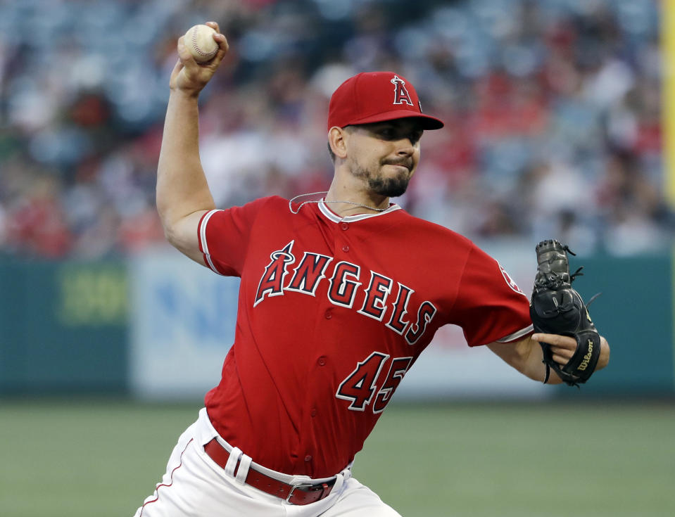 Los Angeles Angels starting pitcher Taylor Cole throws to a Seattle Mariners batter during the first inning of a baseball game Friday, July 12, 2019, in Anaheim, Calif. (AP Photo/Marcio Jose Sanchez)