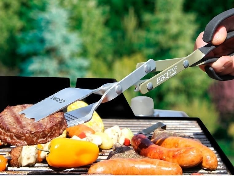 No more fumbling around for the right grill gadget while your burgers are ready to be flipped: This acts as a spatula, tongs and brush all in one. <br /><br /><strong>Promising review:</strong> "Bought it for my son in law for Christmas, a grill master! Loved not burning his wrist on the big grill, and can pick up all large cuts of meat and small pieces of vegetable without a problem. Very well-made. Extremely pleased with this purchase!" &mdash; Joyce<br /><br /><strong>Get it from The Grommet for <a href="https://go.skimresources.com?id=38395X987171&amp;xs=1&amp;url=https%3A%2F%2Fwww.thegrommet.com%2Fproducts%2Fbbq-croc-3in1-bbq-tool&amp;xcust=HPHandheldKitchenTools607ef55ae4b01bc7979c2797" target="_blank" rel="noopener noreferrer">$17.95+</a> (available in three sizes).</strong>