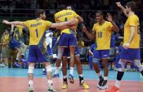 2016 Rio Olympics - Volleyball - Men's Gold Medal Match Italy v Brazil - Maracanazinho - Rio de Janeiro, Brazil - 21/08/2016. Bruno (BRA) of Brazil, Mauricio De Souza (BRA) of Brazil, Wallace Leandro De Souza (BRA) of Brazil, Lucarelli (BRA) of Brazil and Lucas (BRA) of Brazil celebrate winning the second set. REUTERS/Yves Herman