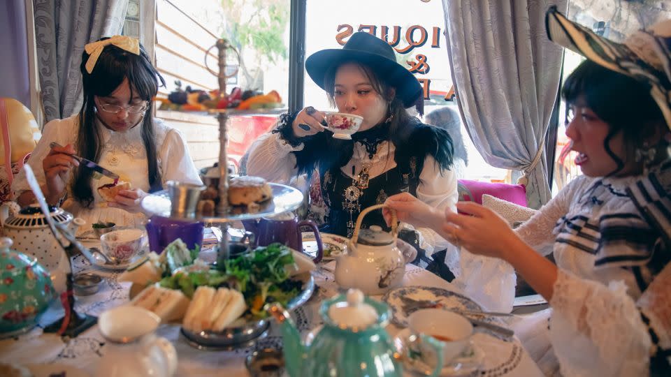 From left: Lauren, Ella, and Nghi enjoy a tea party at Lovejoy's Tea Room in San Francisco, California, on September 10, 2023. Lolita tea parties and similar events provide an opportunity for community-building among Lolitas, as well as a chance to flaunt their best fashions. - Shelby Knowles