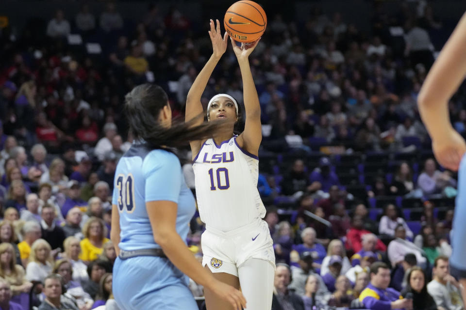 LSU forward Angel Reese (10) shoots in the first half an NCAA college basketball game against Kent State in Baton Rouge, La., Tuesday, Nov. 14, 2023. (AP Photo/Gerald Herbert)