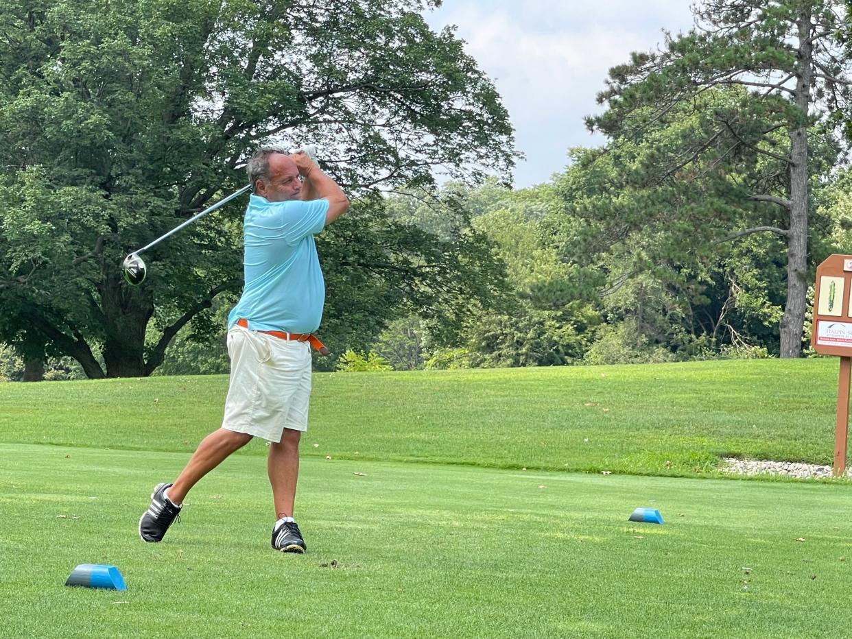 Aris Andrews hits his tee shot on No. 2 at Erskine Park Golf Club During a sudden death playoff Sunday. Andrews parred the hole to defeat Randy Moreno for the South Bend Senior Metro championship.