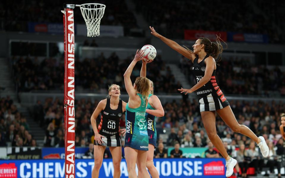 The Collingwood Magpies and the Melbourne Vixens in action last year - GETTY IMAGES