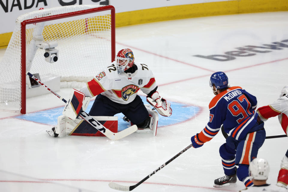 Connor McDavid scores one of the Oilers' eight goals in Saturday's rout. (Harry How/Getty Images)