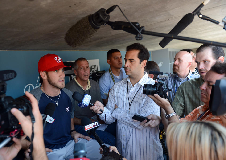 LOS ANGELES, CA - APRIL 28: Bryce Harper #34 of the Washington Nationals speaks to the media in his major league debut during practice before the game against the Los Angeles Dodgers at Dodger Stadium on April 28, 2012 in Los Angeles, California. (Photo by Harry How/Getty Images)