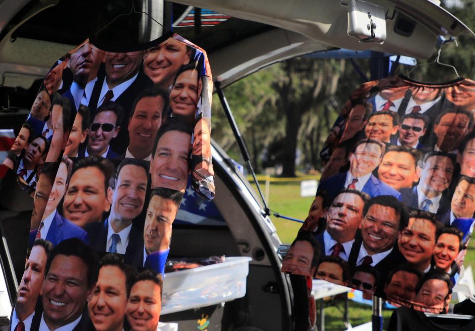 Shirts for sale with Gov. Ron DeSantis's face all over them were available for people to buy as they entered his campaign event, conducted at 2A Ranch in Ormond Beach on Saturday, Nov. 5th, 2022.