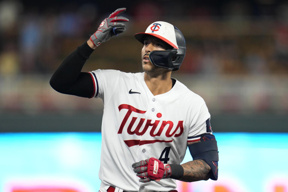 Minnesota Twins' Carlos Correa celebrates his solo home run against the New York Mets during the fourth inning of a baseball game Friday, Sept. 8, 2023, in Minneapolis. (AP Photo/Abbie Parr)