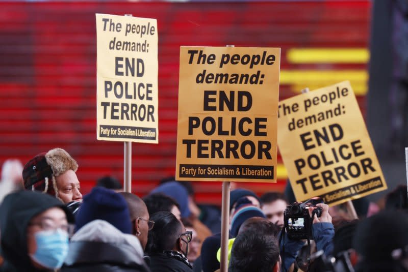 People gather and hold signs at a Justice for Tyre Nichols protest in Times Square in New York City in January. A federal grand jury on Tuesday indicted five former Memphis, Tenn., police officers on civil-rights violations related to the January beating death of Nichols. File Photo by John Angelillo/UPI