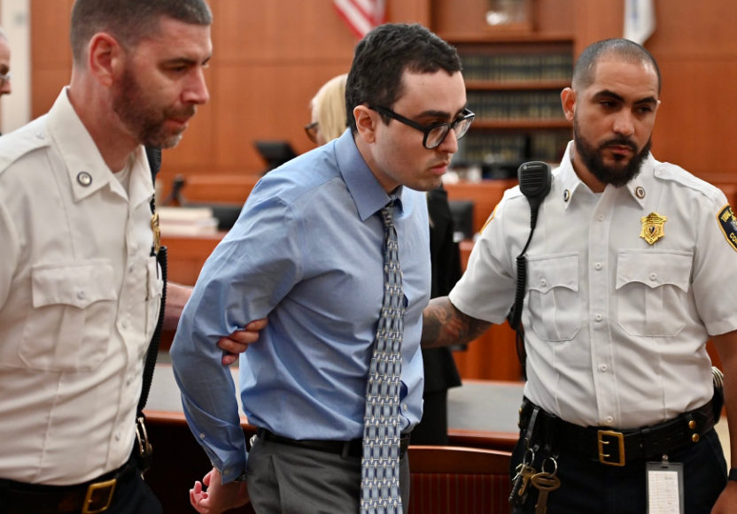 Carlos Asencio is escorted from the courtroom after the verdict.