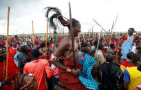 Maasai Morans from Mbirikani Manyatta, celebrate victory in the 2018 Maasai Olympics at the Sidai Oleng Wildlife Sanctuary, at the base of Mt. Kilimanjaro, near the Kenya-Tanzania border in Kimana, Kajiado, Kenya December 15, 2018. REUTERS/Thomas Mukoya