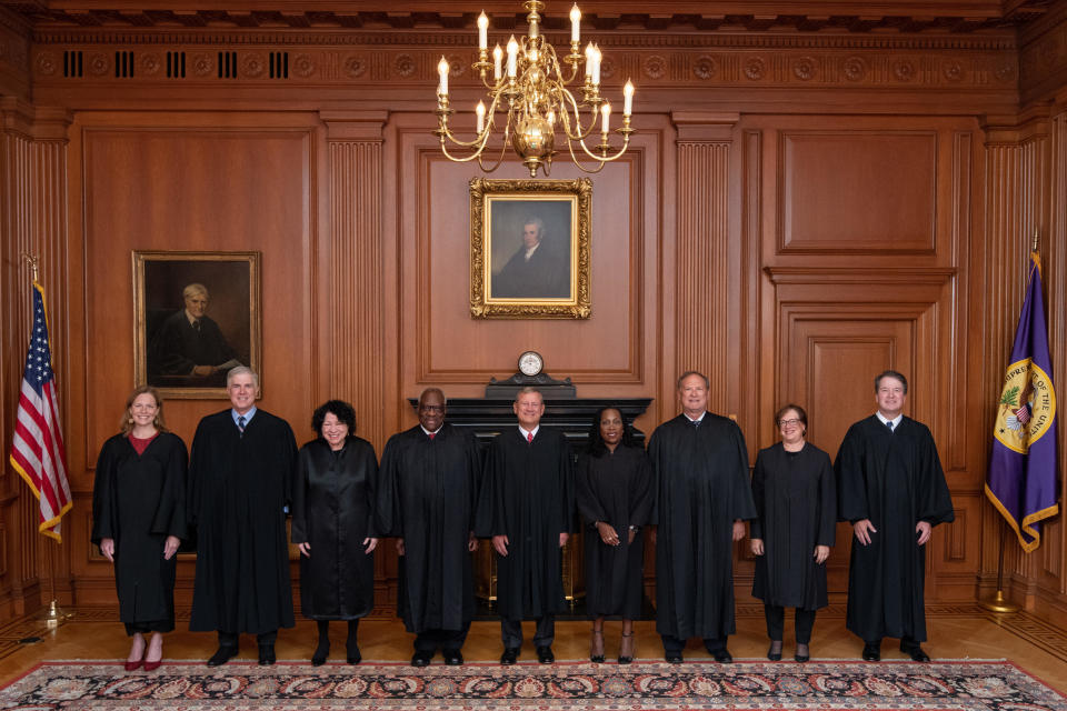 The Supreme Court held a special sitting on September 30, 2022, for the formal investiture ceremony of Associate Justice Ketanji Brown Jackson. From left to right: Associate Justices Amy Coney Barrett, Neil M. Gorsuch, Sonia Sotomayor, and Clarence Thomas, Chief Justice John G. Roberts, Jr., and Associate Justices Ketanji Brown Jackson, Samuel A. Alito, Jr., Elena Kagan, and Brett M. Kavanaugh.  / Credit: Collection of the Supreme Court of the United States