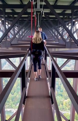 <p>Matt and Karen Smith</p> The pedestrian bridge walk