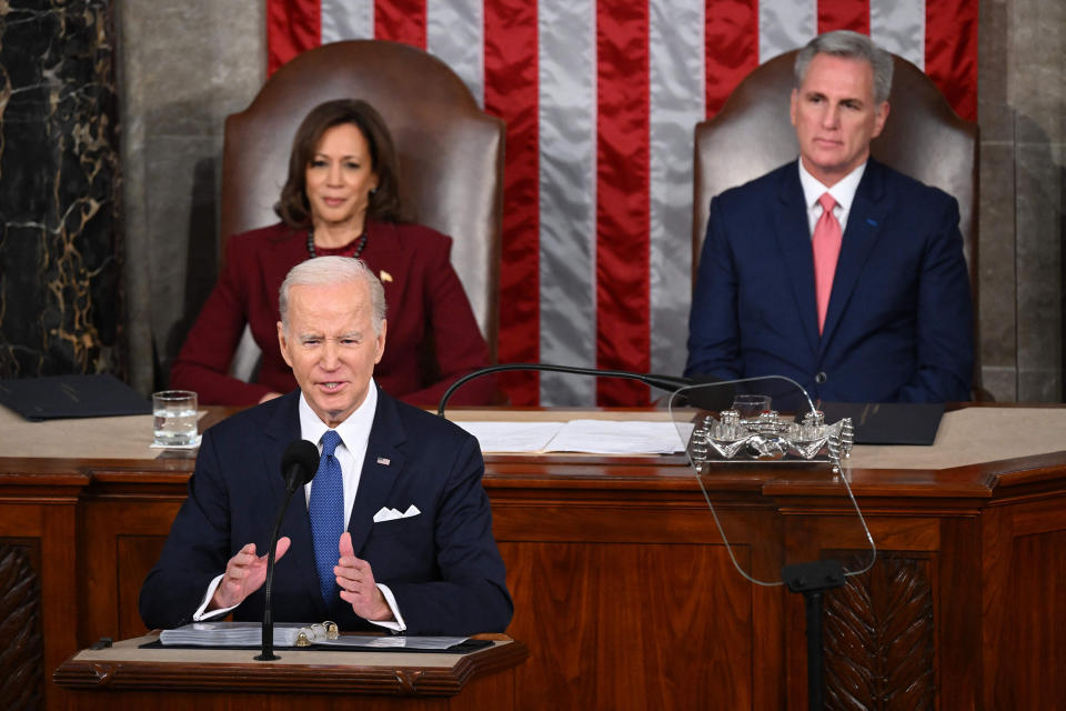 Vice President Kamala Harris and US Speaker of the House Kevin McCarthy (R-CA) listen as US President Joe Biden delivers the State of the Union address in the House Chamber of the US Capitol in Washington, DC, on February 7, 2023. (Saul Loeb / AFP - Getty Images)