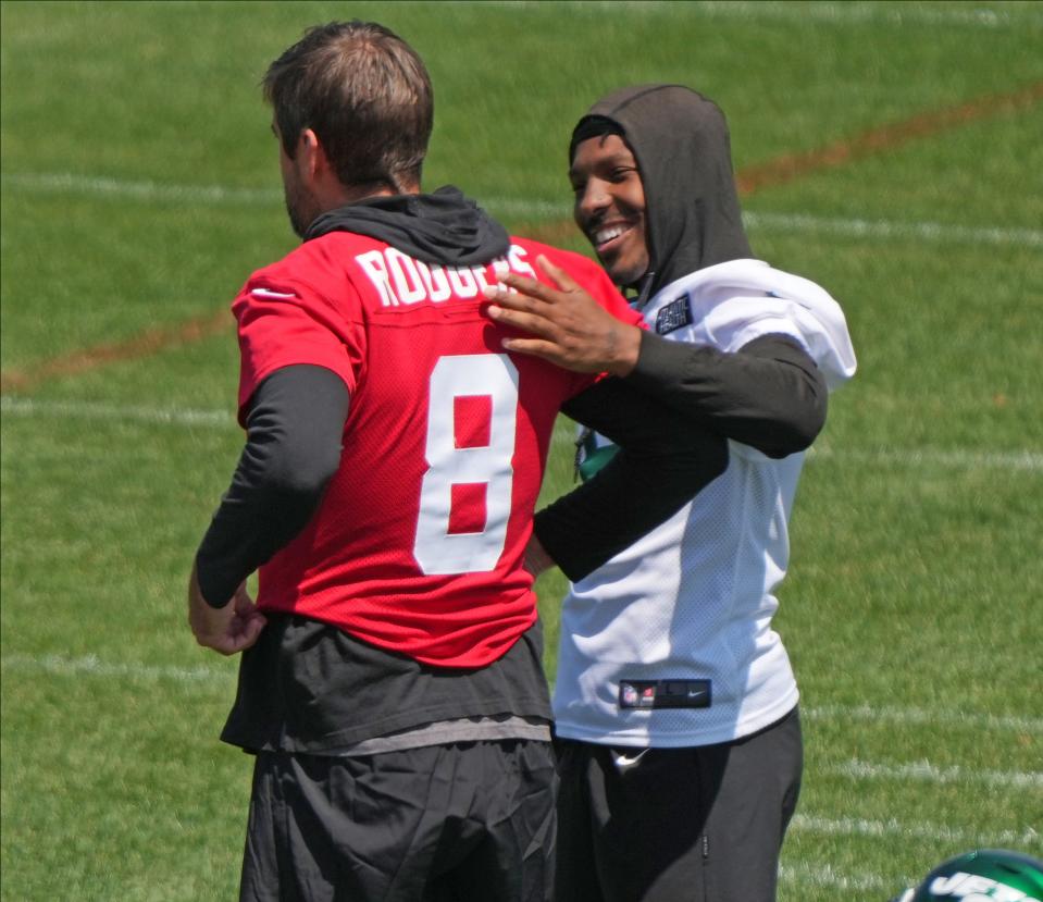 Florham Park, NJ May 31, 2023 — Mecole Hardman Jr. and quarterback, Aaron Rodgers during the Jets OTA.