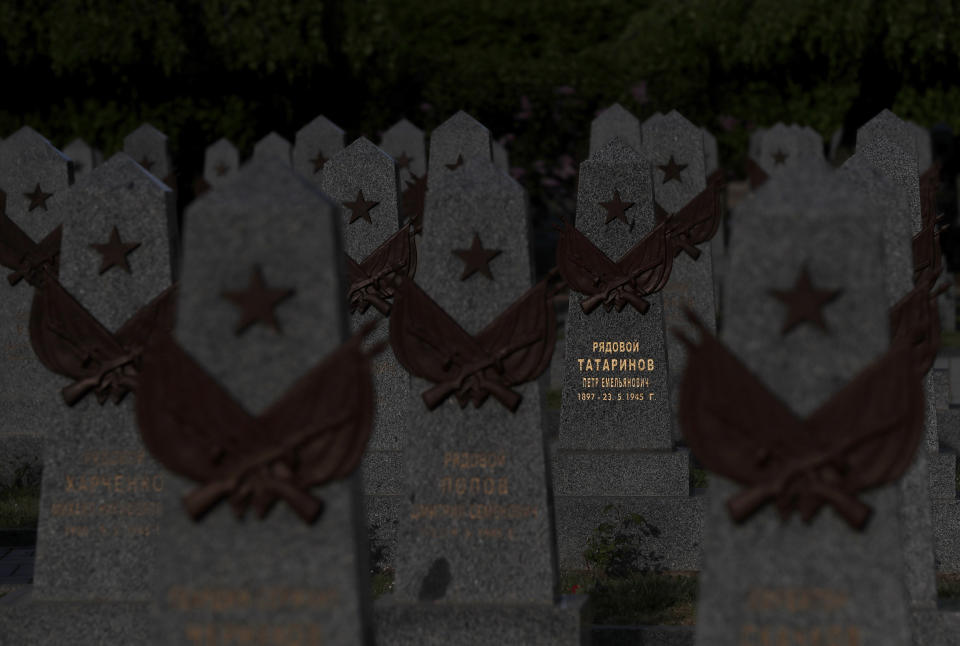 In this photo taken on Wednesday, May 6, 2020, a view of tombstones at the Soviet World War II memorial in Prague, Czech Republic. Relations between the Czech Republic and Russia have taken a turn for the worse in a series of disputes over the interpretation of historical events. Three Prague politicians whose recent actions upset Russia have been placed under police protection amid a media report that Russian intelligence services have been plotting to poison them with the deadly toxin ricin. Russia has opened a criminal investigation into Prague's removal of a war memorial to a World War II hero, among other actions that have tested diplomatic ties. (AP Photo/Petr David Josek)