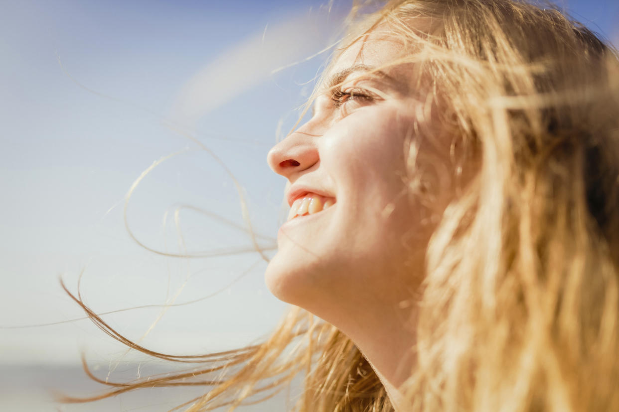 Sunshine may do more than just boost your mood, with research linking higher exposure to reduced coronavirus death rates. (Posed by a model, Getty Images)