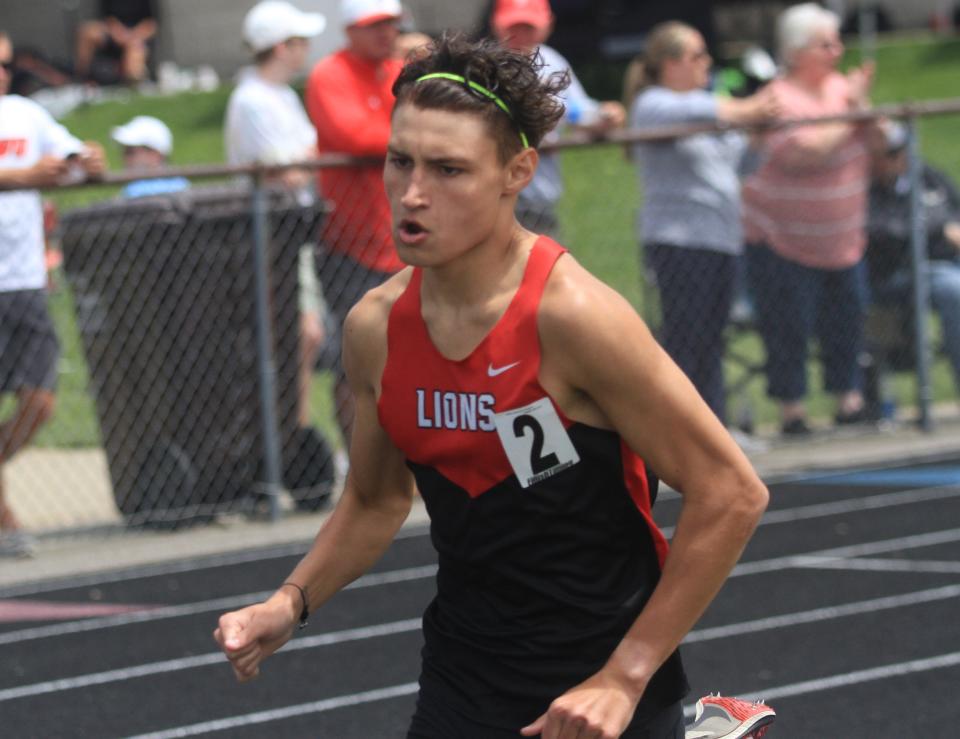 Liberty Union's Teddy Jencson competes in the 1,600 during the Division II regional championships at Lexington on Saturday, May 27, 2023. Jencson ran a time of 4:28.12 to take runner-up and qualify for state.