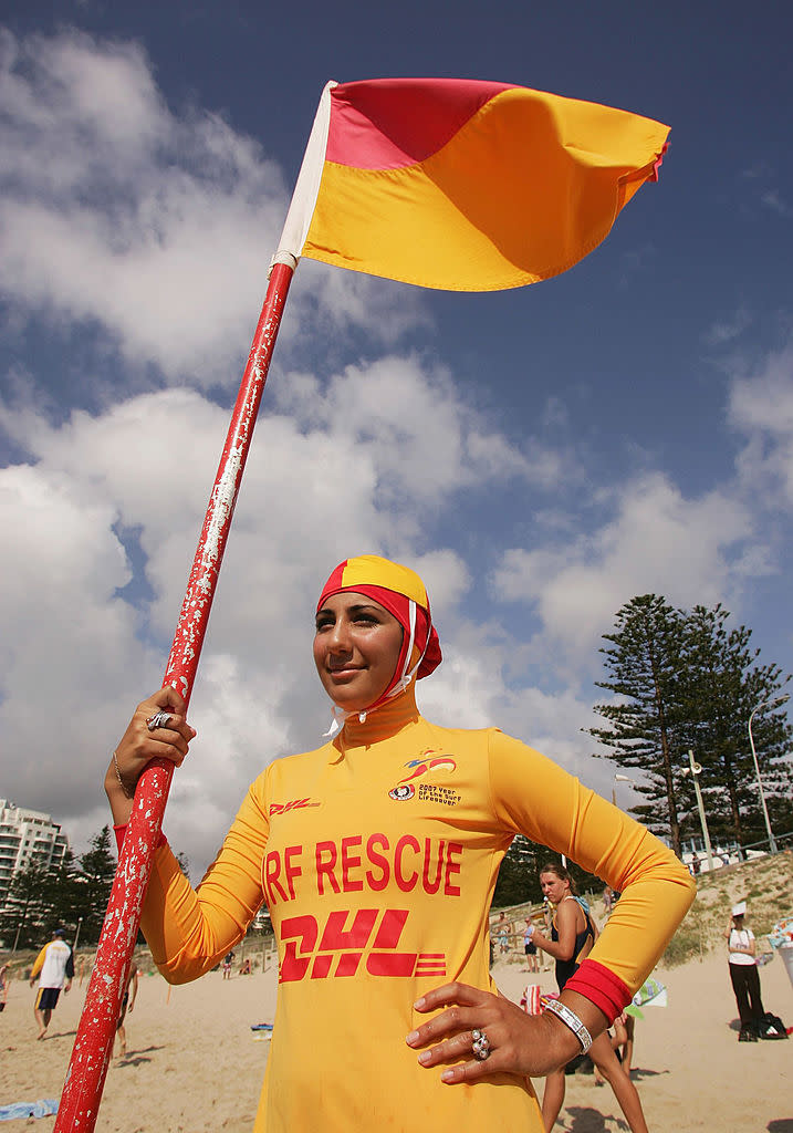 SYDNEY, AUSTRALIA - FEBRUARY 04:  Mecca Laa Laa wears a 'Burqini' on her first surf lifesaving patrol at North Cronulla Beach February 4, 2007 in Sydney, Australia. The red and yellow 'Burqini' was specially designed for Muslim lifesavers to allow females to fulfil both their patrolling and religious obligations.  (Photo by Matt King/Getty Images)