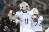 Tulsa quarterback Zach Smith (11) throws a pass in front of Central Florida defensive back Antwan Collier (3) during the first half of an NCAA college football game Saturday, Oct. 3, 2020, in Orlando, Fla. (AP Photo/Phelan M. Ebenhack)