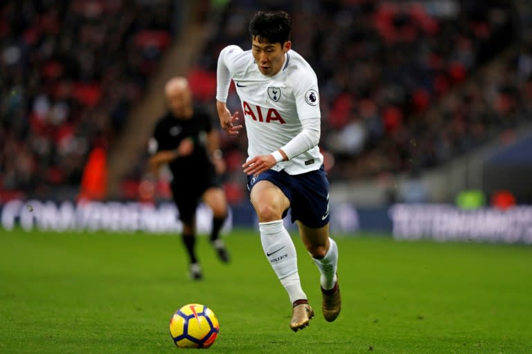 Tottenham Hotspur's striker Son Heung-Min runs with the ball on December 9, 2017