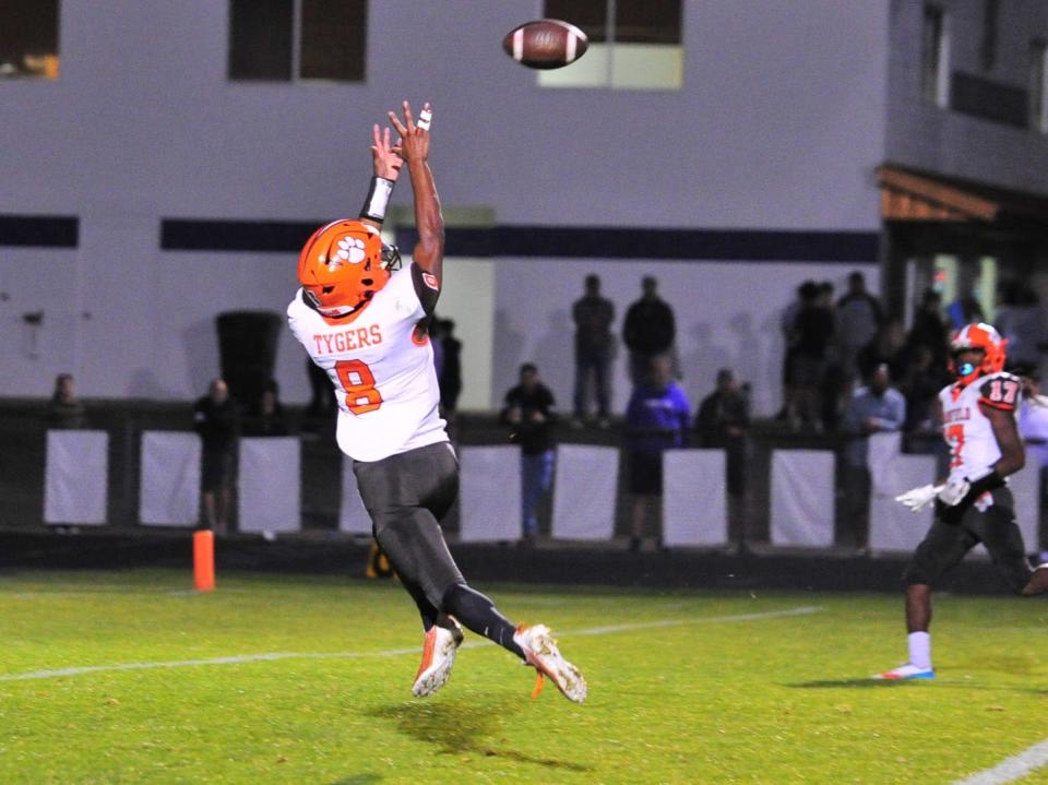 Mansfield Senior's Amarr Davis extends for a catch during the Tygers' win over Lexington in Week 6.