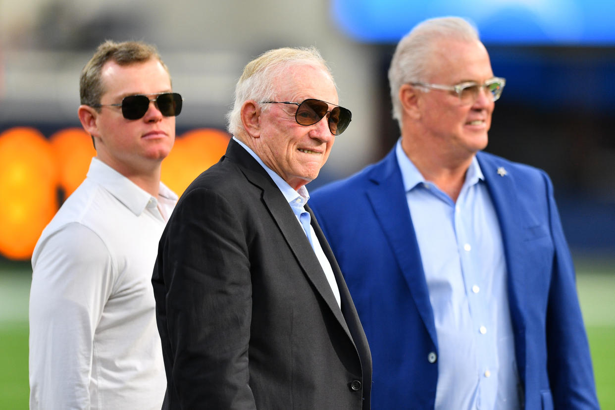 INGLEWOOD, CA - AUGUST 20: Dallas Cowboys cowboys owner Jerry Jones, center, stands on the field with his son Stephen Jones and grandson Shy Anderson Jr. before the NFL preseason game between the Dallas Cowboys and the Los Angeles Chargers on August 20, 2022, at SoFi Stadium in Inglewood, CA. (Photo by Brian Rothmuller/Icon Sportswire via Getty Images)