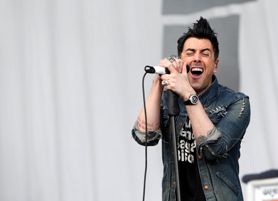 READING, ENGLAND - AUGUST 27:  Ian Watkins of Lost Prophets performs live on the Main stage during day one of Reading Festival on August 27, 2010 in Reading, England.  (Photo by Simone Joyner/WireImage)