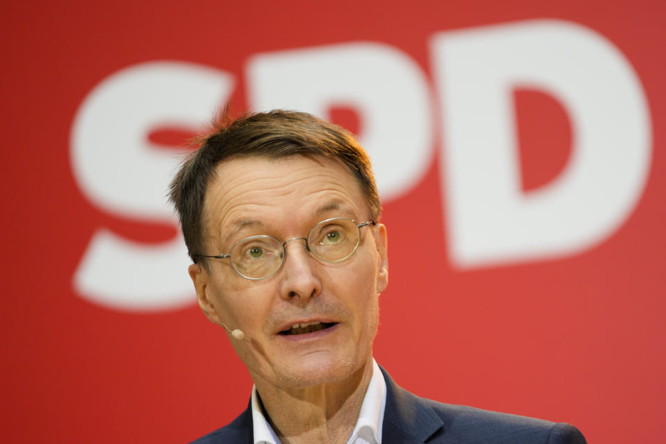 Designated new German Health Minister Karl Lauterbach of the Social Democratic Party, SPD, speaks during a news conference at the party's headquarters in Berlin, Germany, Monday, Dec. 6, 2021. German parliament Bundestag is planning to elect Olaf Scholz of the SPD as new chancellor on Wednesday Dec. 8, 2021. (AP Photo/Markus Schreiber)