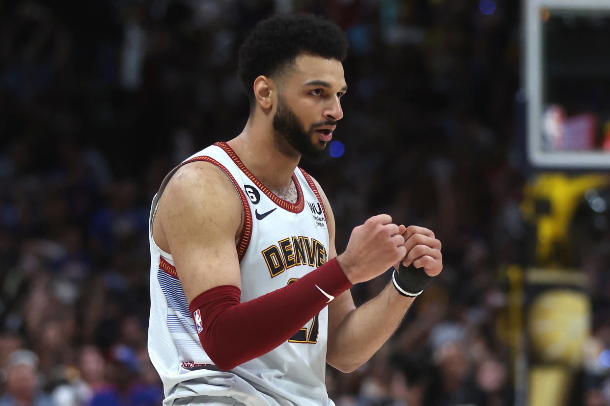 DENVER, COLORADO - JUNE 12: Jamal Murray #27 of the Denver Nuggets reacts during the fourth quarter against the Miami Heat in Game Five of the 2023 NBA Finals at Ball Arena on June 12, 2023 in Denver, Colorado. NOTE TO USER: User expressly acknowledges and agrees that, by downloading and or using this photograph, User is consenting to the terms and conditions of the Getty Images License Agreement. (Photo by Matthew Stockman/Getty Images)