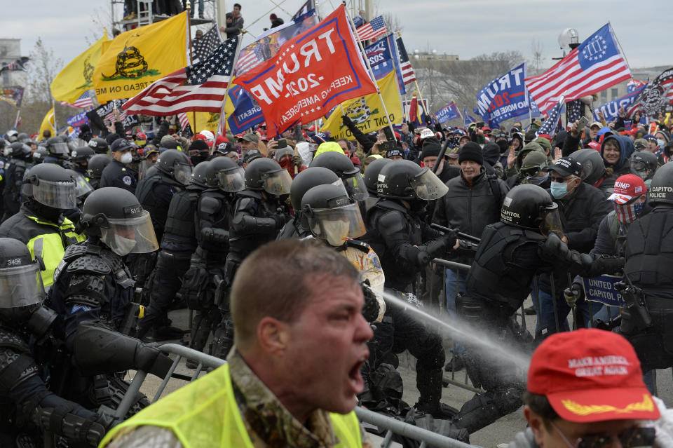 Trump supporters clash with police and security forces as they try to storm the Capitol on Jan. 6, 2021. 