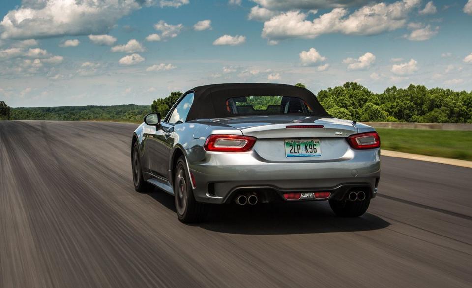 <p>The U.S. market will lose another convertible this year as Fiat pulls the handbrake on <a href="https://www.caranddriver.com/fiat/124-spider" rel="nofollow noopener" target="_blank" data-ylk="slk:124 Spider;elm:context_link;itc:0;sec:content-canvas" class="link ">124 Spider</a> production. Built in Japan alongside the Mazda MX-5 Miata (the world's happiest looking car), the 124 Spider packed a 160-hp single-overhead cam engine versus the Miata’s 155-hp dual-overhead cam 2.0-liter. Built on the same platform as the Miata, the 124 Spider was a more forgiving experience for everyday use thanks to its softer springs and damping. The 124 Spider Abarth wasn’t as gentle and the stiffer springs and added power, including 184 pound-feet of torque from a turbocharged 1.4-liter for Abarth models, brought turbo lag. Despite having nine extra horses, the heavier 124 Spider Abarth was slower than the Miata to 60 mph and the quarter mile when we compared the two in 2016. At our annual <a href="https://www.caranddriver.com/features/a23319884/lightning-lap-times-historical-data/" rel="nofollow noopener" target="_blank" data-ylk="slk:Lightning Lap;elm:context_link;itc:0;sec:content-canvas" class="link ">Lightning Lap</a>, the 124 Spider Abarth's lap time is quicker than any Miata we've lapped there. </p><p>Mazda bumped <a href="https://www.caranddriver.com/reviews/a22678665/2019-mazda-mx-5-miata-engine-more-power/" rel="nofollow noopener" target="_blank" data-ylk="slk:output to 181 horsepower;elm:context_link;itc:0;sec:content-canvas" class="link ">output to 181 horsepower</a> and Fiat zipped the bag closed over the Spider's honeycomb grille. Like an episode of <em>Survivor</em>, the tribe of Americans still buying tiny roadsters had spoken. Fiat only sold 1711 124 Spiders in 2020. Mazda moved 8807 of its roadsters.</p>